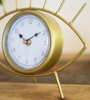 Golden Eye-Shaped Analog Table Clock