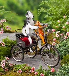 Metal Dog and Cat on Tricycle Sculpture