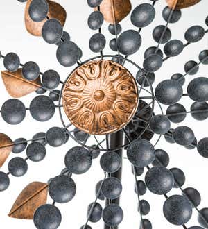 Weathered Gray and Bronze-Colored Metal Cups and Leaves Wind Spinner