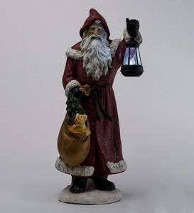 Santa Claus with Solar Lantern and a Puppy In His Bag Decoration