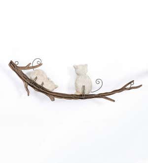 Two Cats Formed From Faux Rocks Sitting on a Branch Wall Art