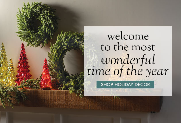 Image of Glass trees with wreaths and garland on mantel & wall - welcome to the most wonderful time of the year SHOP HOLIDAY DECOR