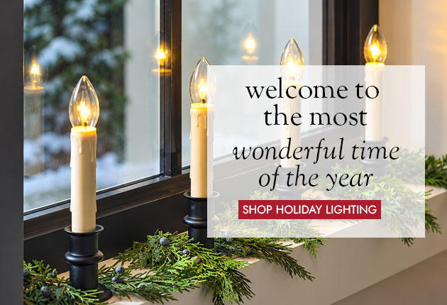 Image of Adjustable Window Hugger Candles, Set of 4 with Remote. welcome to the most wonderful time of the year. SHOP INDOOR HOLIDAY DECOR