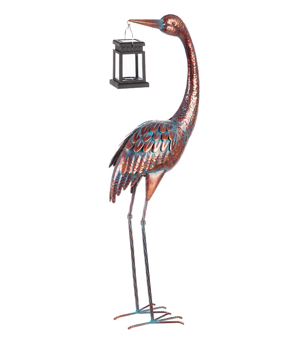 Standing Metal Crane with Antiqued Finish Holding a Solar Lantern