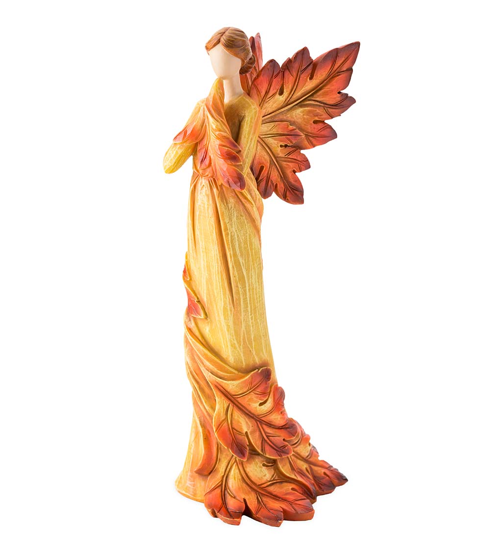 Standing Fall Angel with Leaf Wings and Fiery Hues of Autumn