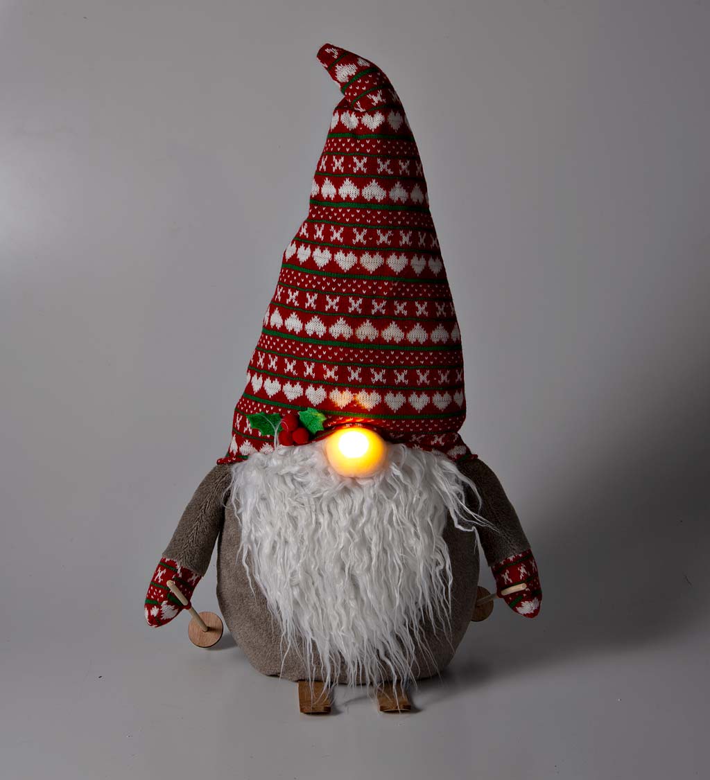 Christmas Gnome on Skis with Knitted Hat and Fuzzy Sweater with Light-Up Nose