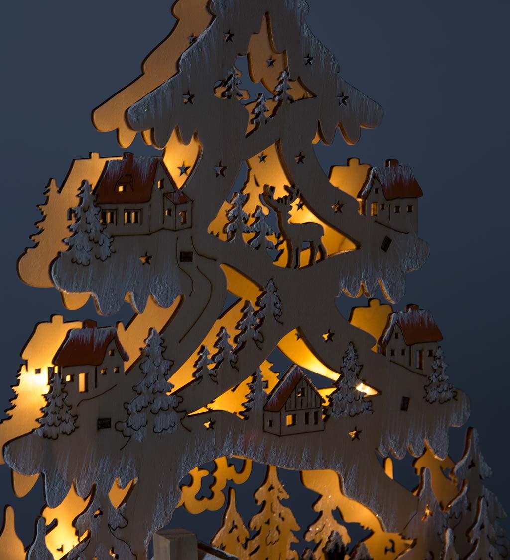 Lighted Woodland Village in a Giant Christmas Tree