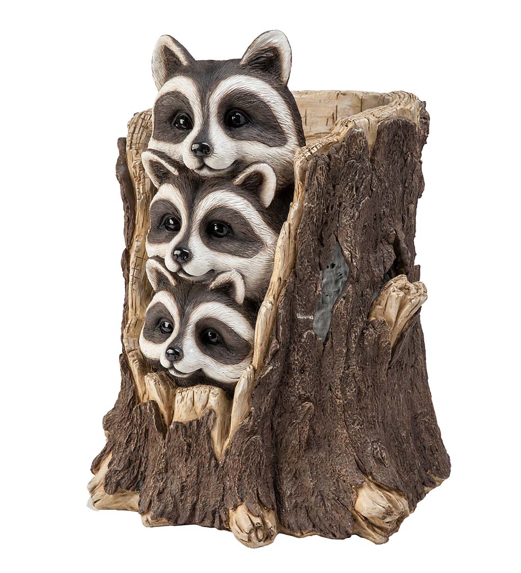 Solar Three Raccoons in a Stump Sculpture