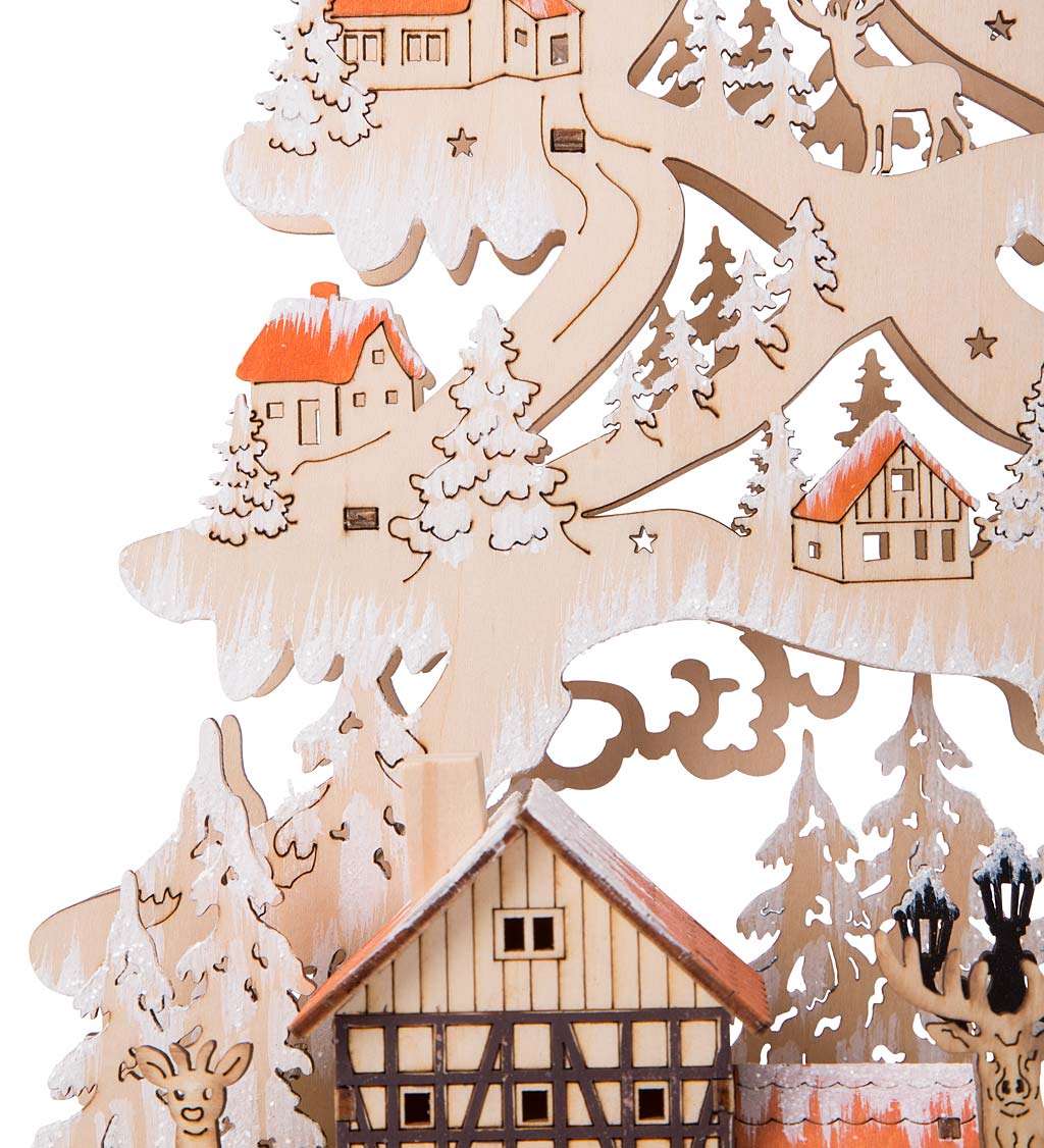 Lighted Woodland Village in a Giant Christmas Tree