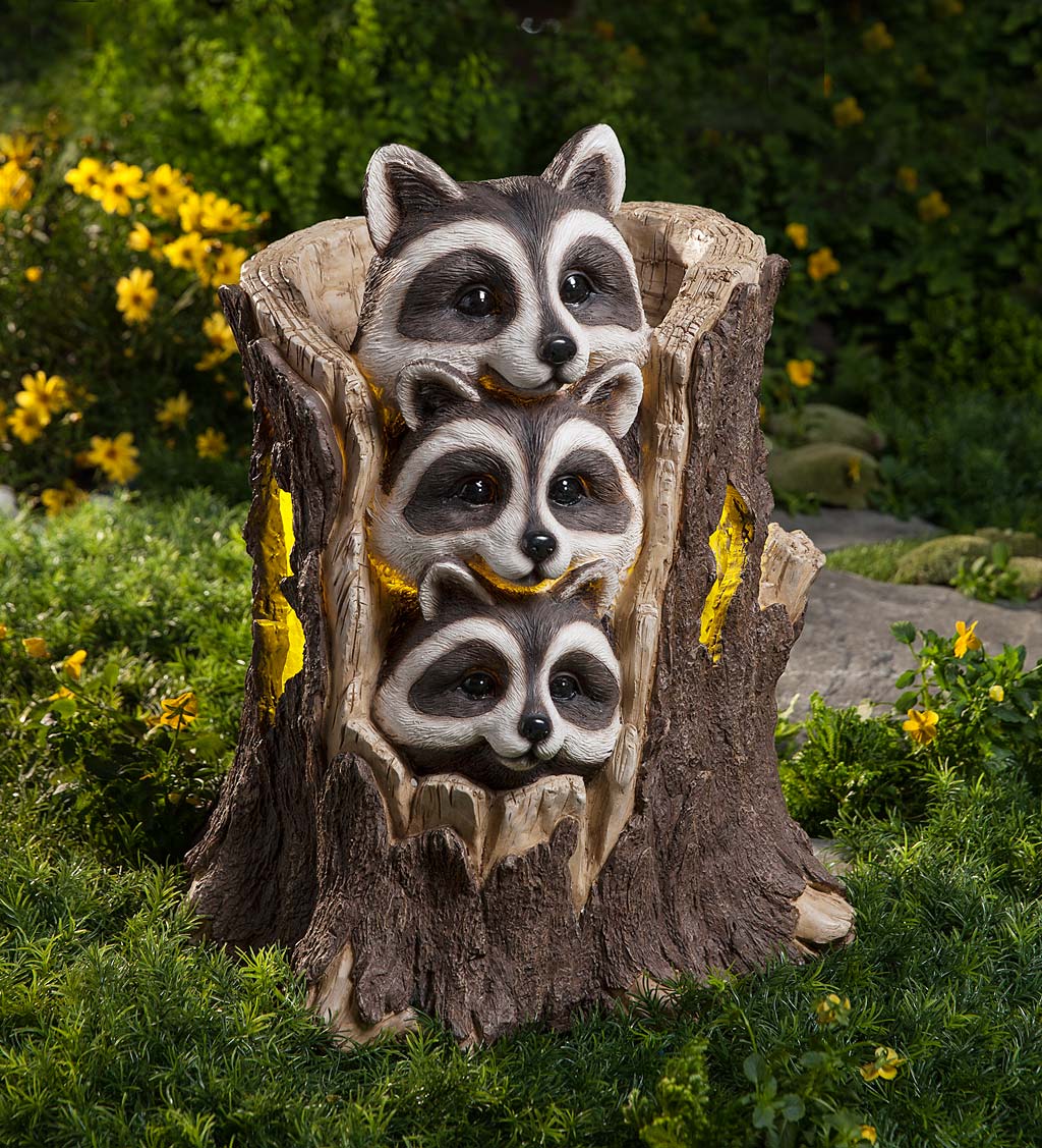 Solar Three Raccoons in a Stump Sculpture