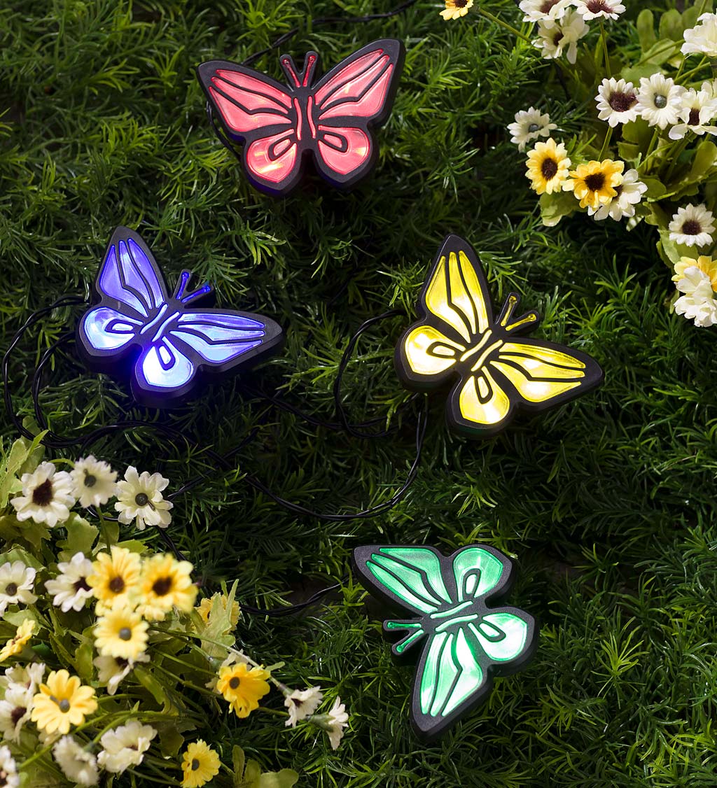 String of Four Solar Lighted Butterfly Garden Stakes with Solar Panel Stake