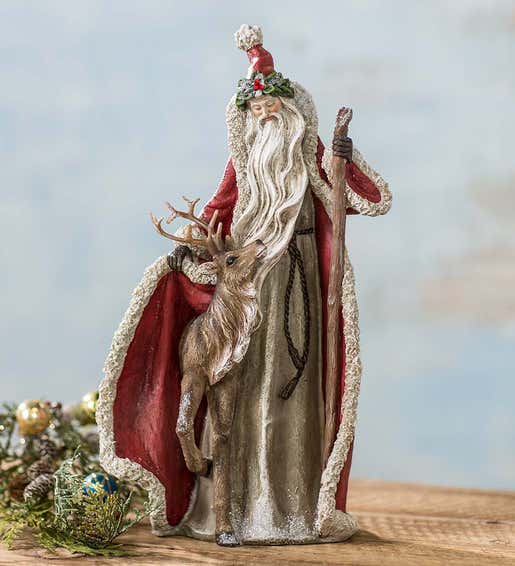 Image of a vintage style Santa with reindeer figurine. Shop Angels & Santas
