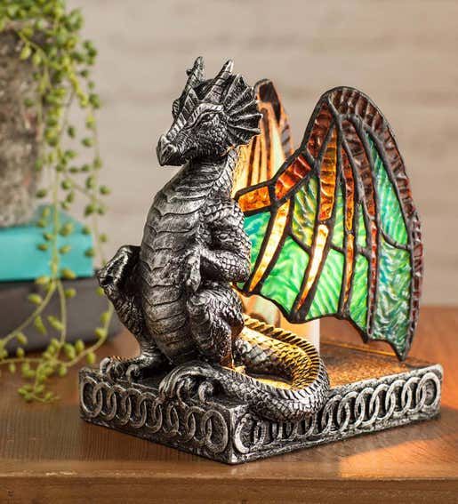 Image of a lighted stained glass green dragon figurine. Shop Gifts for Fantasy Lovers